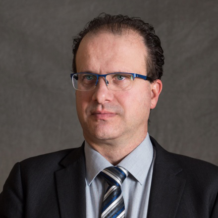 Portrait of Dr. Jovan Zubovic, conference chairperson
